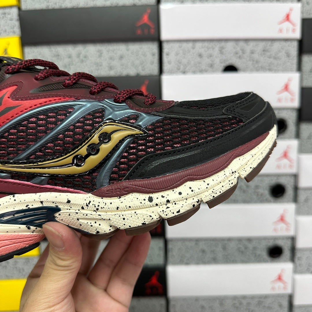 Saucony Omni 9 bordeau