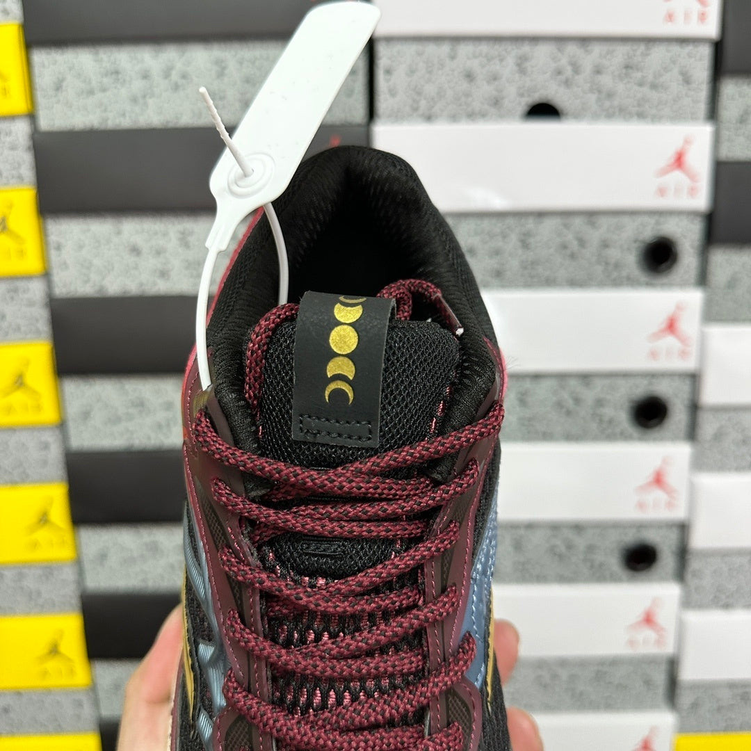 Saucony Omni 9 bordeau